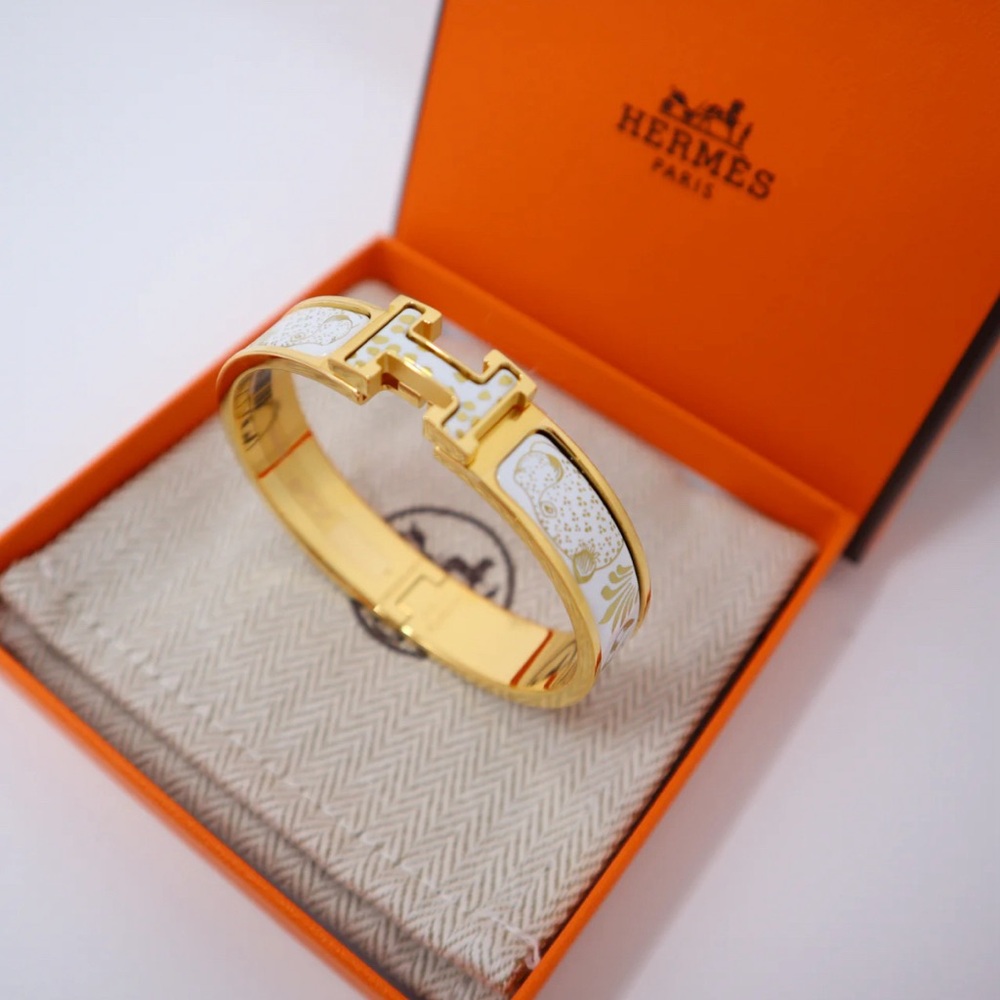 Hermès Gold and White Bracelet